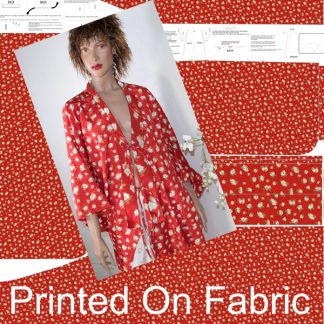 mannequin in red calico kimono angled in front of printed pattern image