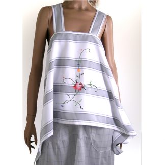mannequin wearing apron top with faux cross stitch